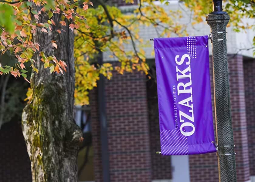 University of Ozarks banner hanging outdoors on campus
